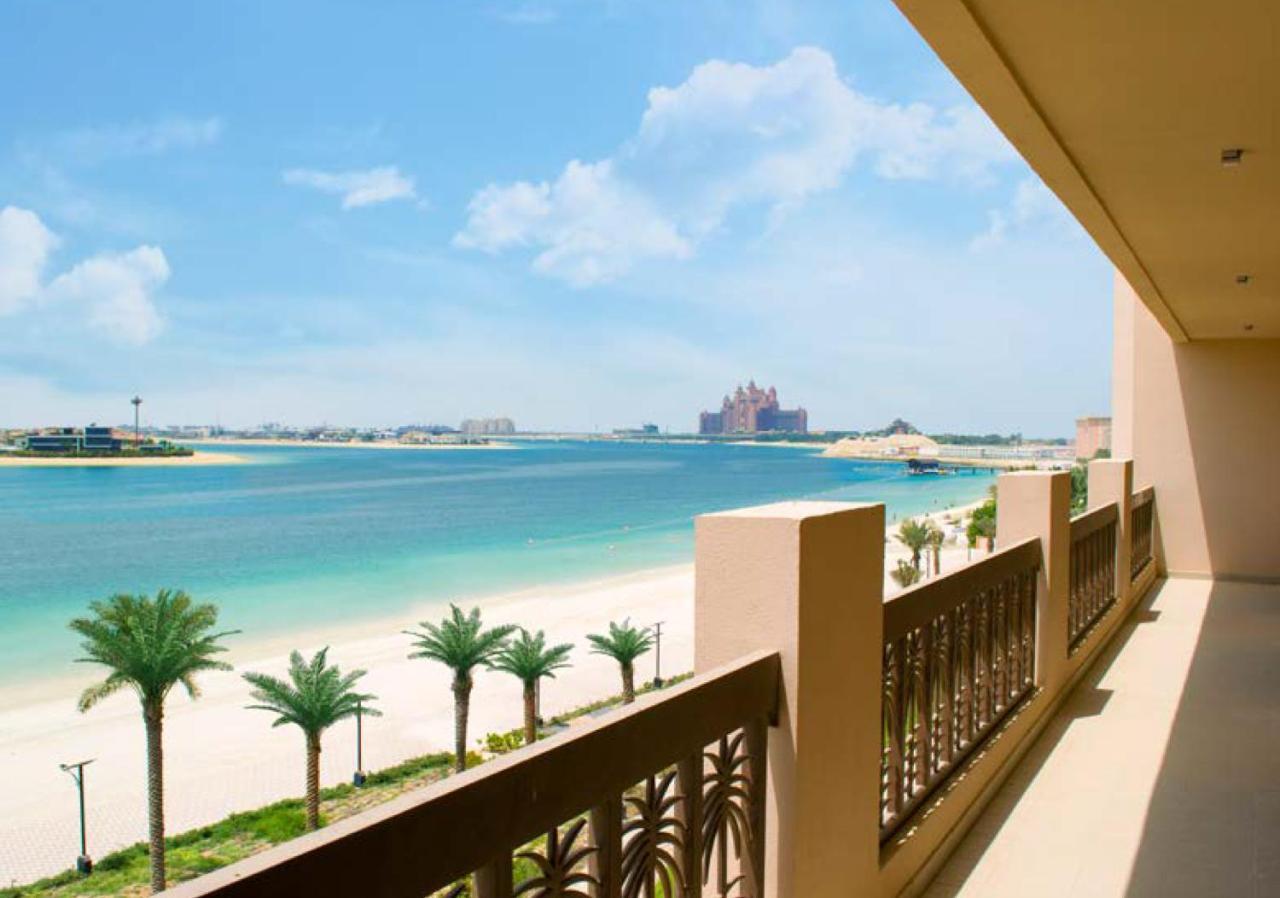 Globalstay At Palm Jumeirah Beachfront Paradise With Pool And Gym Апартаменти *